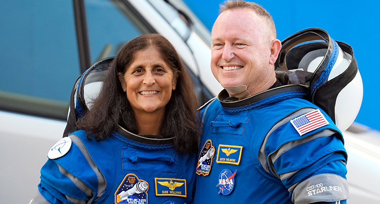 De är glada. De har blå astronaut